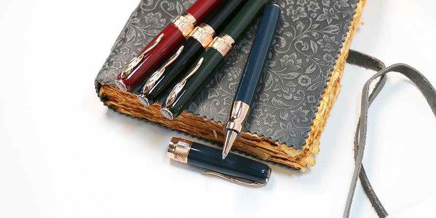 Pineider La Grande Bellezza Classic Rollerball Pens pineider_classic_rollerball_pens_on_notebook
