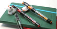 pineider_mistery_fast_filler_demo_14kt_nib_fountain_pens_on_notebooks