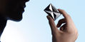 st_dupont_fire_x_line_2_small_lighters_in_hand