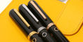 nahvalur_nautilus_cephalopod_pens_on_notebook