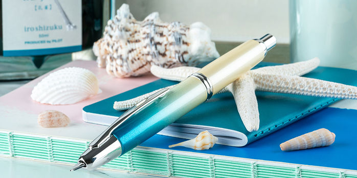 pilot_limited_edition_seashore_vanishing_point_fountain_pen_on_notebook