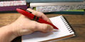 sheaffer_icon_ballpoint_pen_metallic_red_in_hand