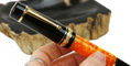 delta_dv_original_oversize_rollerball_pens_in_hand