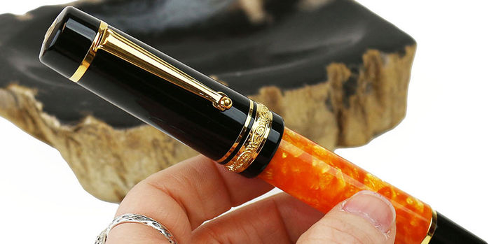delta_dv_original_oversize_rollerball_pens_in_hand