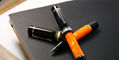 delta_dv_original_oversize_rollerball_pens_underneath_uncapped