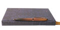 sheaffer_100_coffee_edition_ballpoint_pen_on_notebook