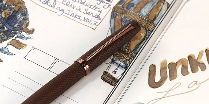 diplomat_viper_brown_fountain_pen_capped_in_notebook
