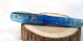 benu_le_christmas_astrogem_fountain_pen_capped_on_wood_trunk