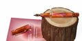nahvalur_schuylkill_breast_cancer_awareness_fountain_pen_uncapped_on_wood