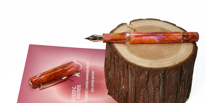 nahvalur_schuylkill_breast_cancer_awareness_fountain_pen_uncapped_on_wood