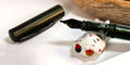 monteverde_mp1_fountain_pen_stub_nib_on_lucky_cat_pen_rest