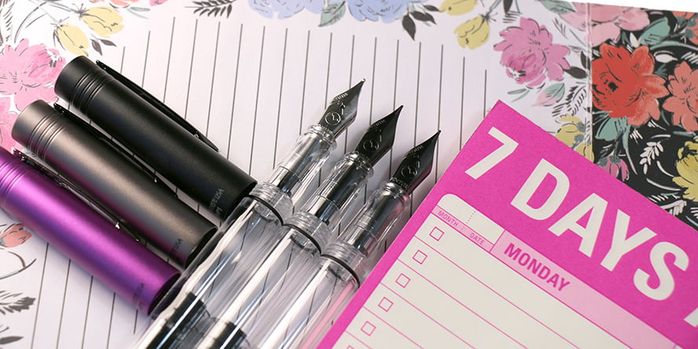 monteverde_mp1_fountain_pens_uncapped_on_notebook