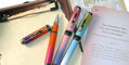 monteverde_innova_ombre_fusion_rollerball_pens_on_clipboard