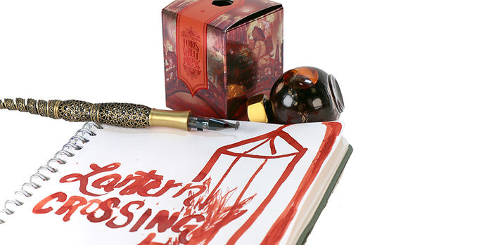 ferris_wheel_press_bestiary_collection_lantern_crossing_ink_in_notebook