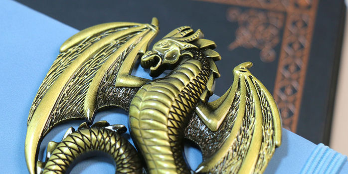 brass_page_holders_morningstar_tail_dragon_up_close