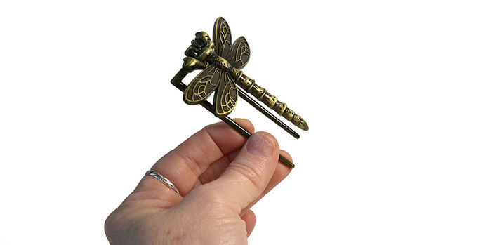 dragonfly_brass_page_holder_in_hand