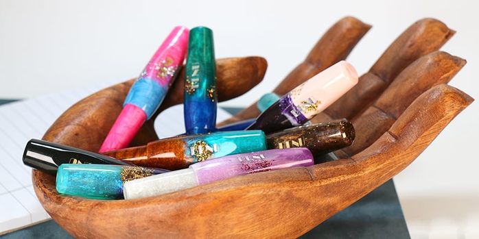 benu_pixie_fountain_pens_in_wood_hands