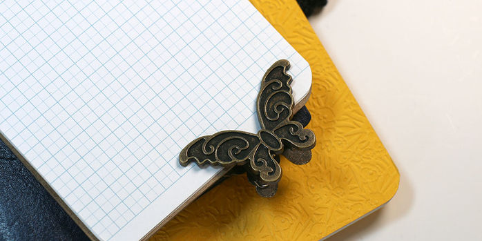 brass_butterfly_binder_clips_travelers_notebook_butterfly_clip_on_graph_paper