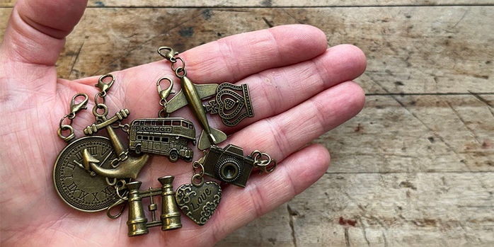 travelers_notebook_brass_3d_charms_in_hand