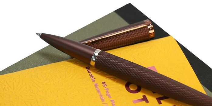 diplomat_viper_brown_rolllerball_pen_on_notebooks