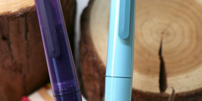 sailor_compass_tuzu_special_edition_fountain_pens_light_blue_and_translucent_violet_up_close