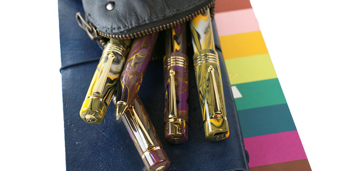 delta_neo_gallery_rollerball_pens_on_notebook