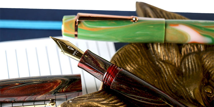 delta_signs_of_time_rococo_and_barocco_fountain_pens_one_uncapped