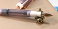 opus_88_2025_harmony_fountain_pen_nib_on_pen_rest