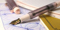 opus_88_2025_harmony_fountain_pen_uncapped_on_notebook_with_drawing