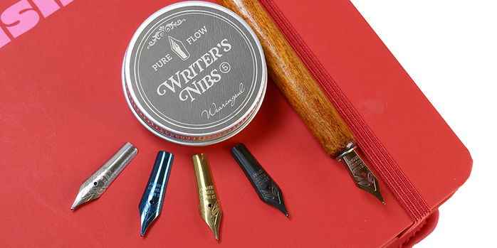 wearingeul_wood_holder_on_notebook_with_nibs