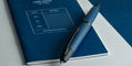 pilot_2025_limited_edition_link_midnight_vanishing_point_fountain_pen_on_notebook
