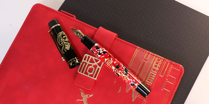 leboeuf_limited_edition_marco_polo_fountain_pen_on_a_red_notebook