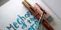 benu_haute_collection_fountain_pens_lustre_and_perle_with_ferris_wheel_press_mechanics_of_the_stars_ink_swatch
