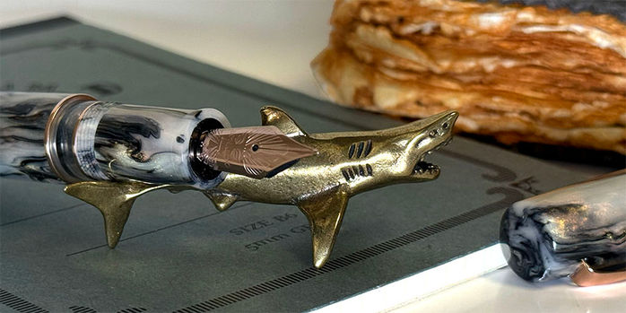 sassy_brassy_shark_pen_rest