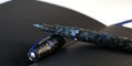 visconti_homo_sapiens_limited_edition_carbon_abyssus_fountain_pens_on_black_dot_grid_paper