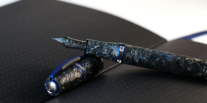 visconti_homo_sapiens_limited_edition_carbon_abyssus_fountain_pens_on_black_dot_grid_paper