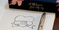 sheaffer_emily_in_paris_100_rollerball_pen_capped_on_notebook