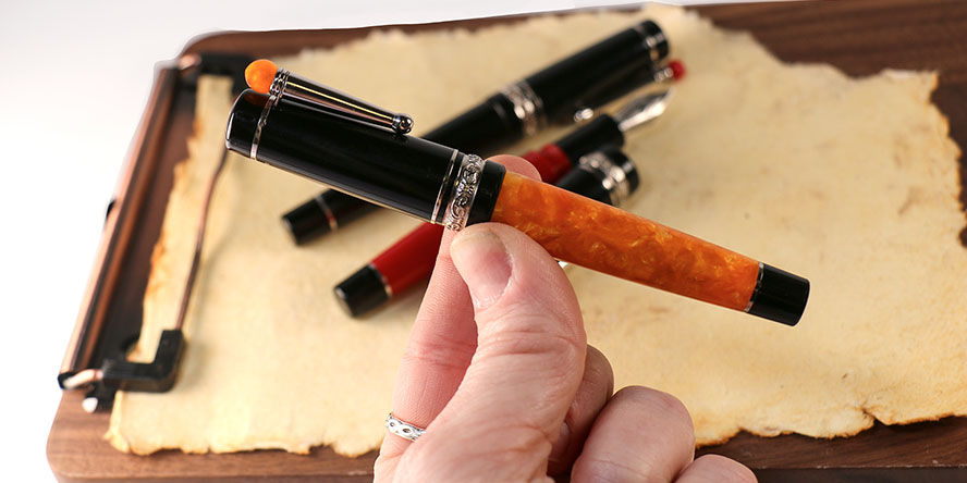 Delta We Mini Rollerball Pens delta_we_dv_original_rollerball_pen_in_hand