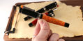 delta_we_dv_original_rollerball_pen_in_hand