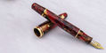 maiora_ultra_ogiva_golden_rule_fountain_pens_resting_on_cap