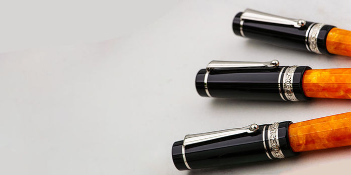 delta_dv_original_mini_rollerball_pen_beside_ballpoint_and_fountain_pen