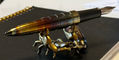 sassy_brassy_scorpion_pen_rest_with_diplomat_aero_rhomb_flame_fountain_pen