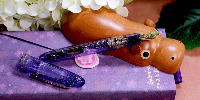 esterbrook_x_sakuradragon_sakura_street_estie_fountain_pens_on_kyoku_haku_little_river_hippo_pen_rest