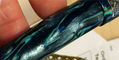 conklin_mark_twain_brass_chased_fountain_pens_resin_closeup