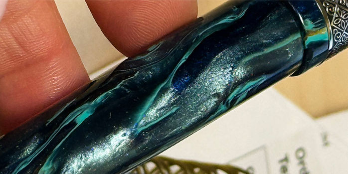 conklin_mark_twain_brass_chased_fountain_pens_resin_closeup