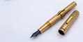 conklin_mark_twain_brass_chased_fountain_pens_uncapped